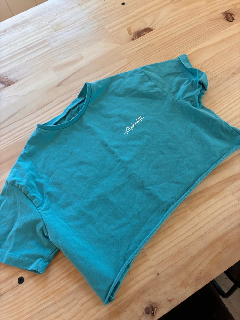 Alphalete Teal Crop Tee with Script Logo